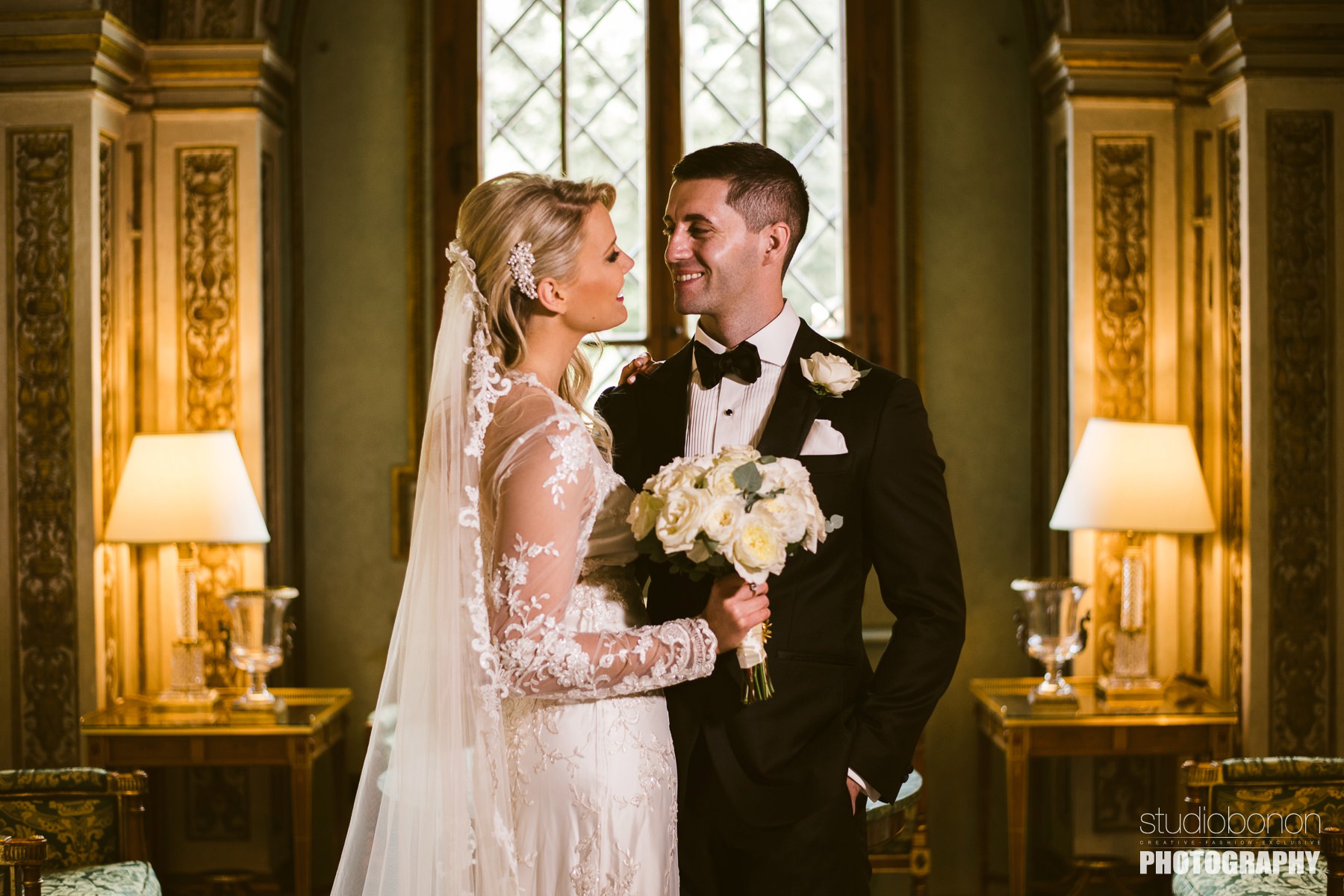 Lovely bride and groom portrait photo into the small chapel at Hotel Four Seasons Florence