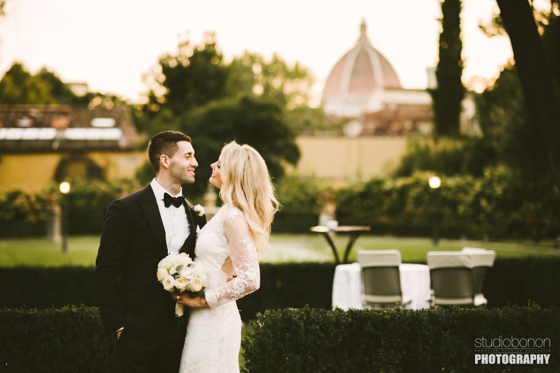 Elegant wedding photo with beautiful bride Amy and stunning groom Adrian with Florence Dome in the background
